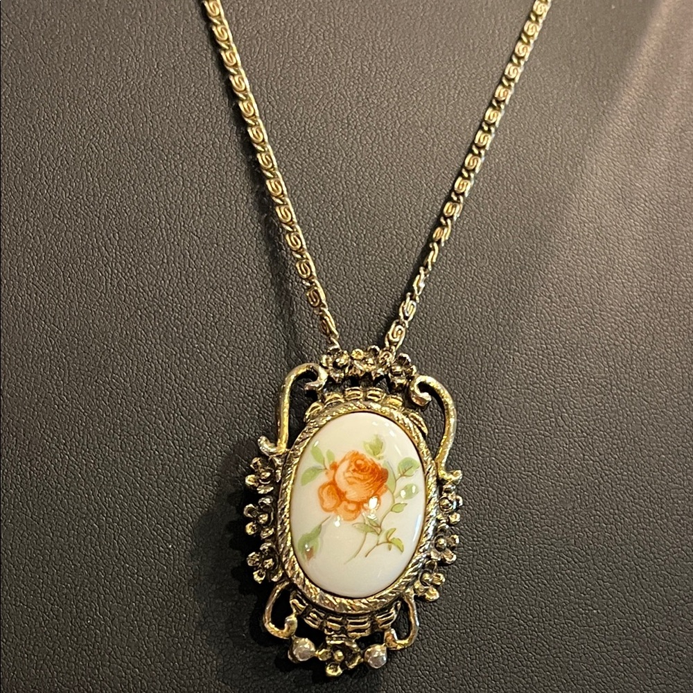 Vintage Floral Pendant & 26” gold tone chain. Can be worn as a Brooch.